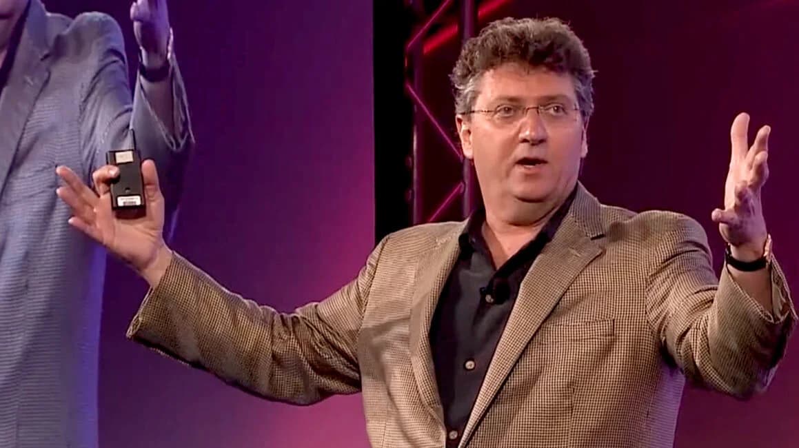 Bill Sims speaking on stage