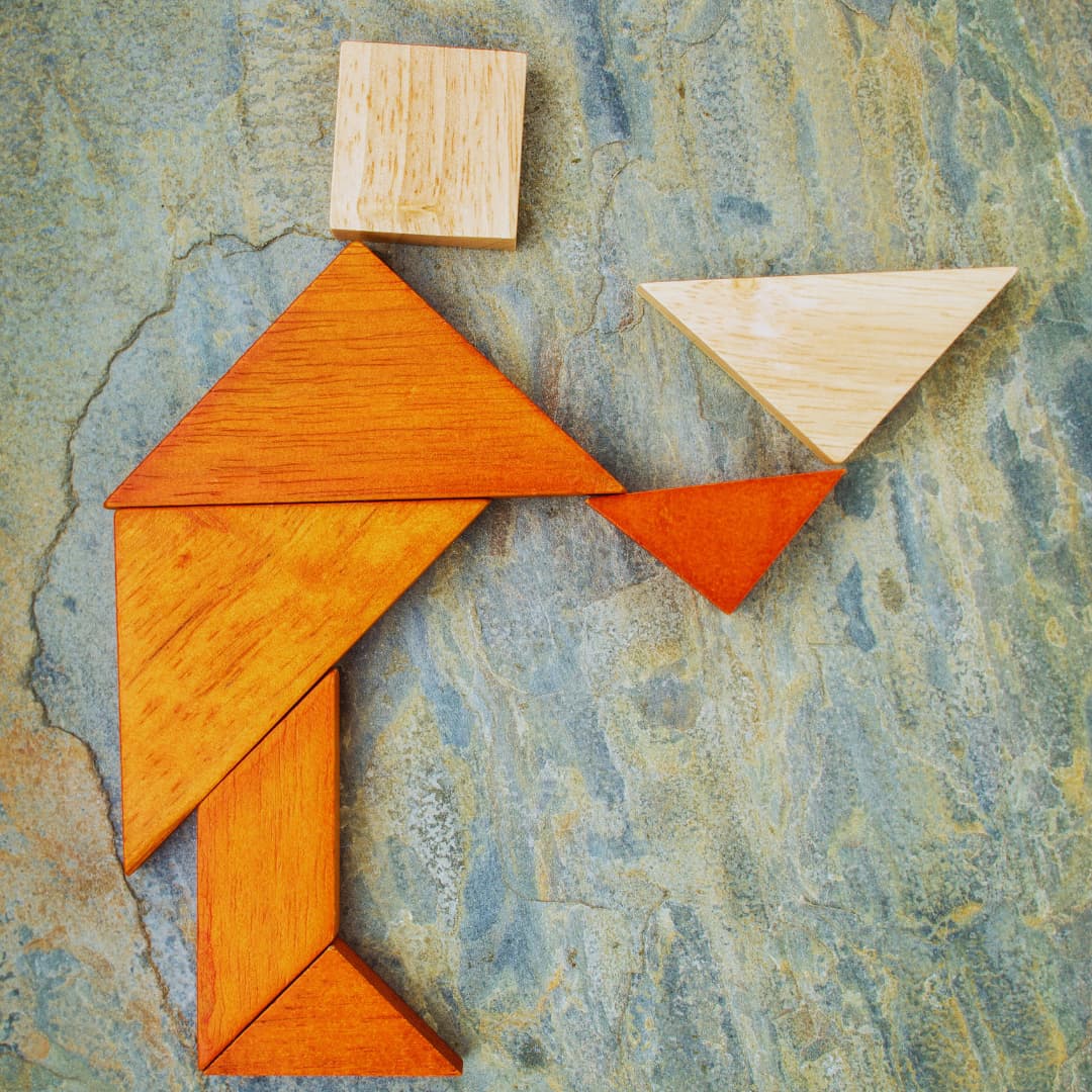Wooden geometric shapes arranged as a landscape
