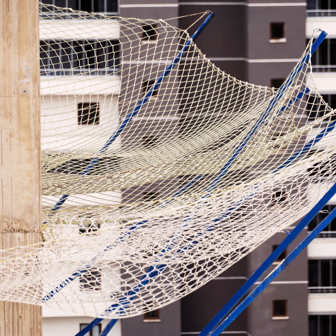 A construction safety net on a building exterior
