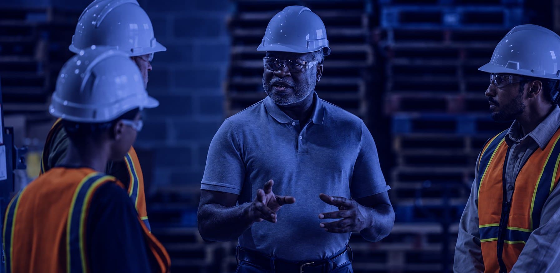 A supervisor listening to his crew during a toolbox talk